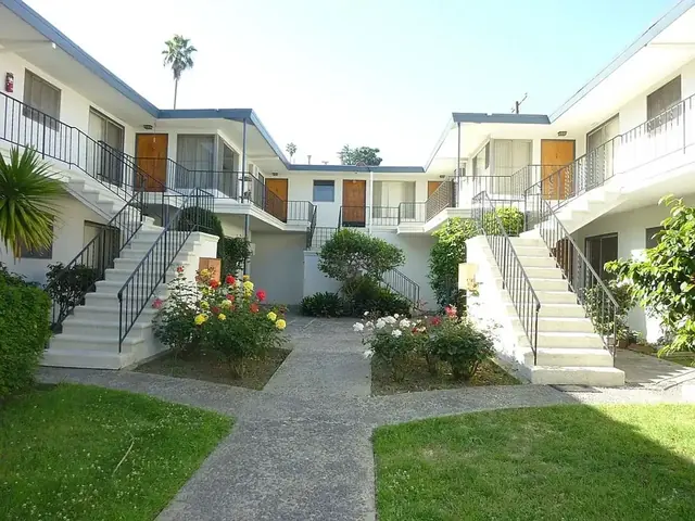 Two-story courtyard apartment building typical of Alhambra, CA
